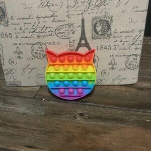 A rainbow cat pop it